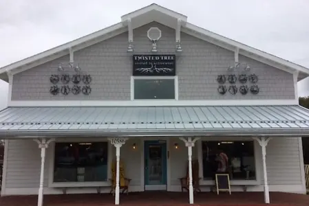 Twisted Tree building sign
