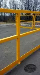 Commercial railing square yellow painted