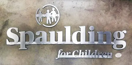 Spaulding silver sign