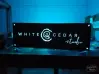White Cedar Studio cyan led sign